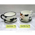 handpainted cow ceramic milk cup and saucer